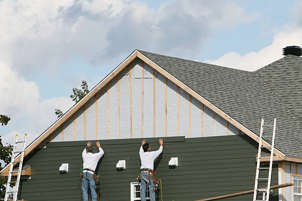 Professional Storm Damage Siding Repair technician working in Simpson, NC